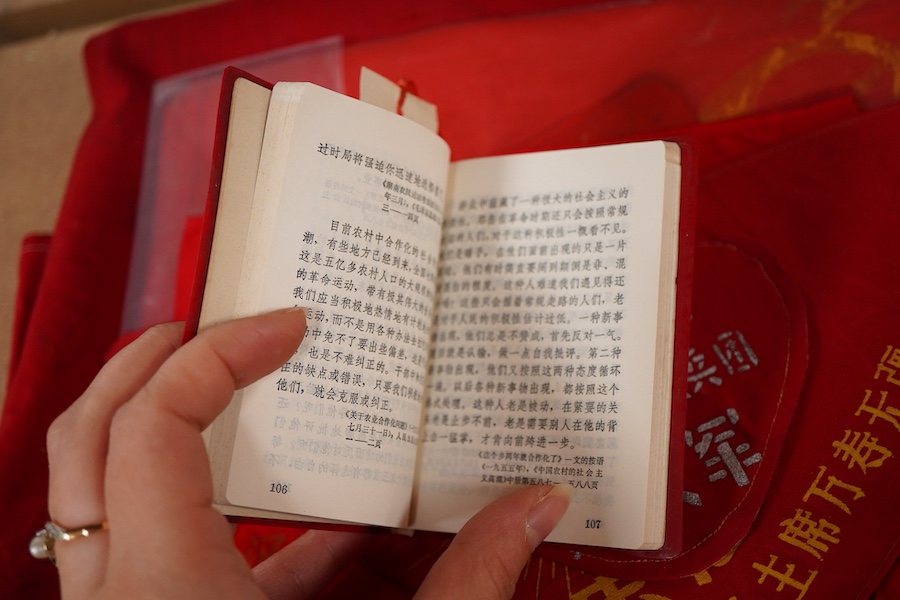 A Chinese Cultural Revolution flag, three armbands, a red book, a badge and a small flag-85cm wide x 102cm long